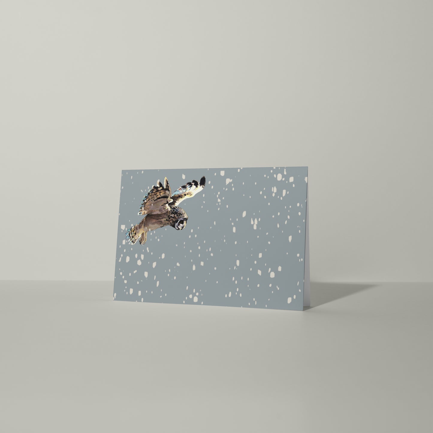 Blank greeting card and envelope hunting short eared owl in the snow christmas card festive winter contemporary illustration animal artist ann pease card art