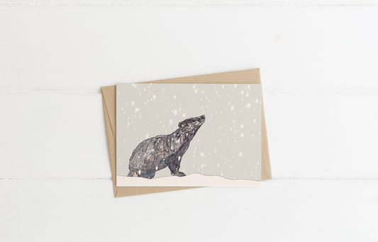 Blank greeting card and envelope badger in the snow christmas card festive winter contemporary illustration animal artist ann pease card art 