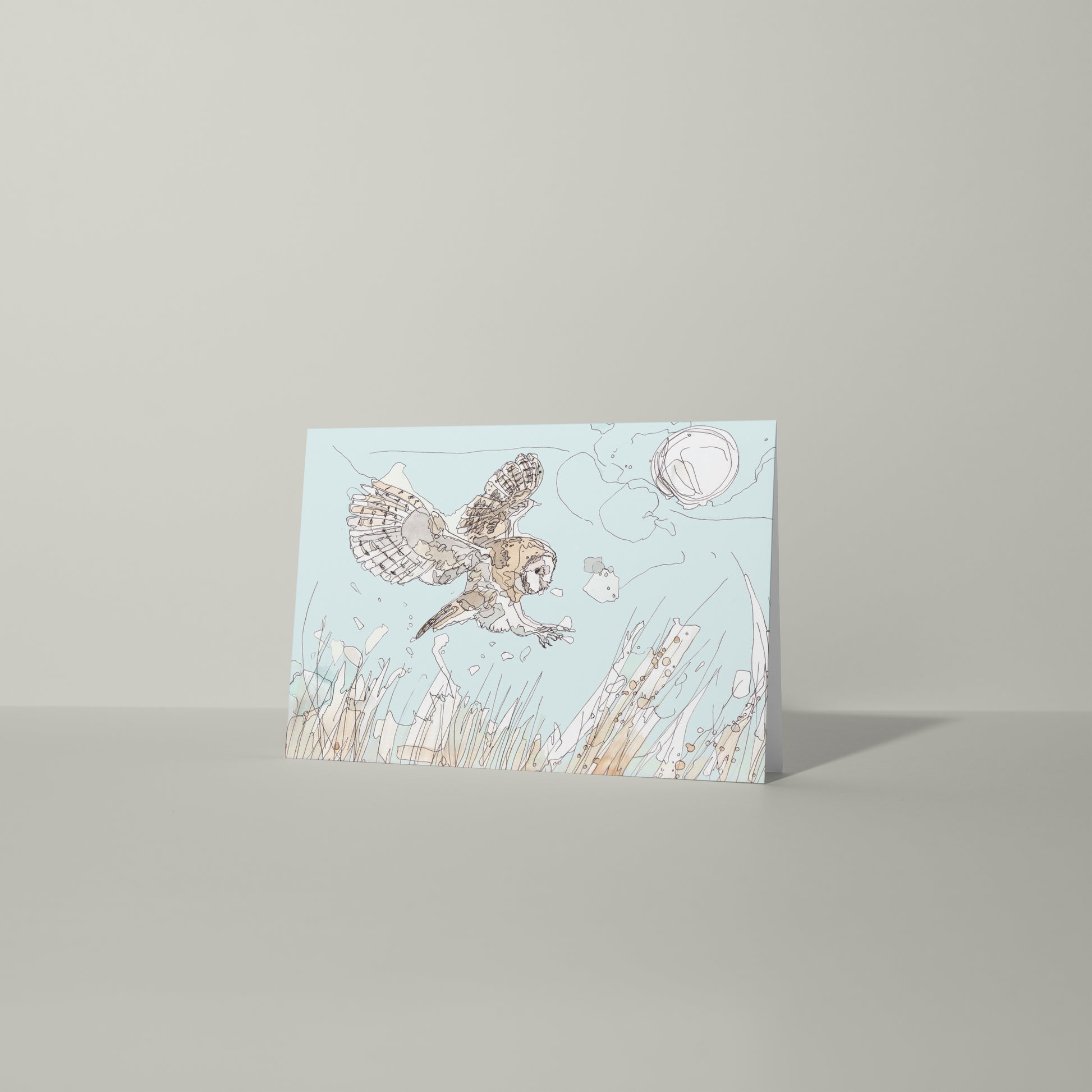 blank greeting card and envelope hunting flying barn owl over meadow grass full moon contemporary illustration animal artist ann pease card art 