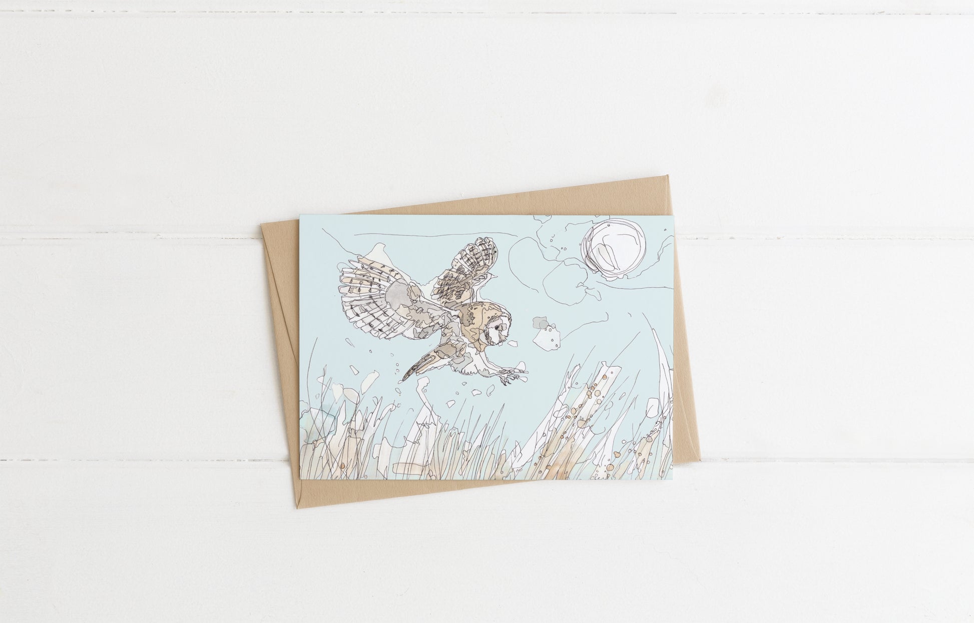 Blank greeting card and envelope  hunting barn owl flying over grass meadow with full moon illustration animal artist ann pease card bird art 