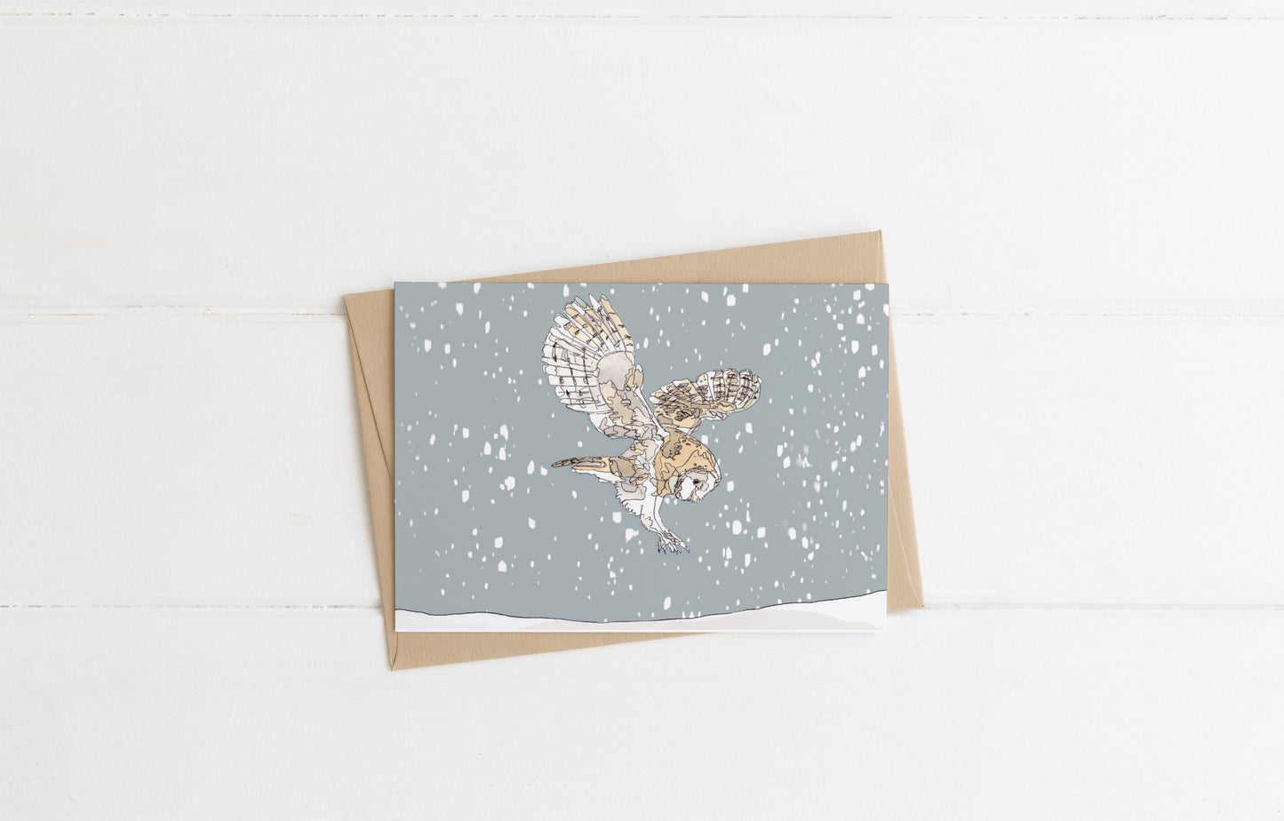 Blank greeting card and envelope  hunting barn owl in the snow christmas card festive winter contemporary illustration animal artist ann pease card art 
