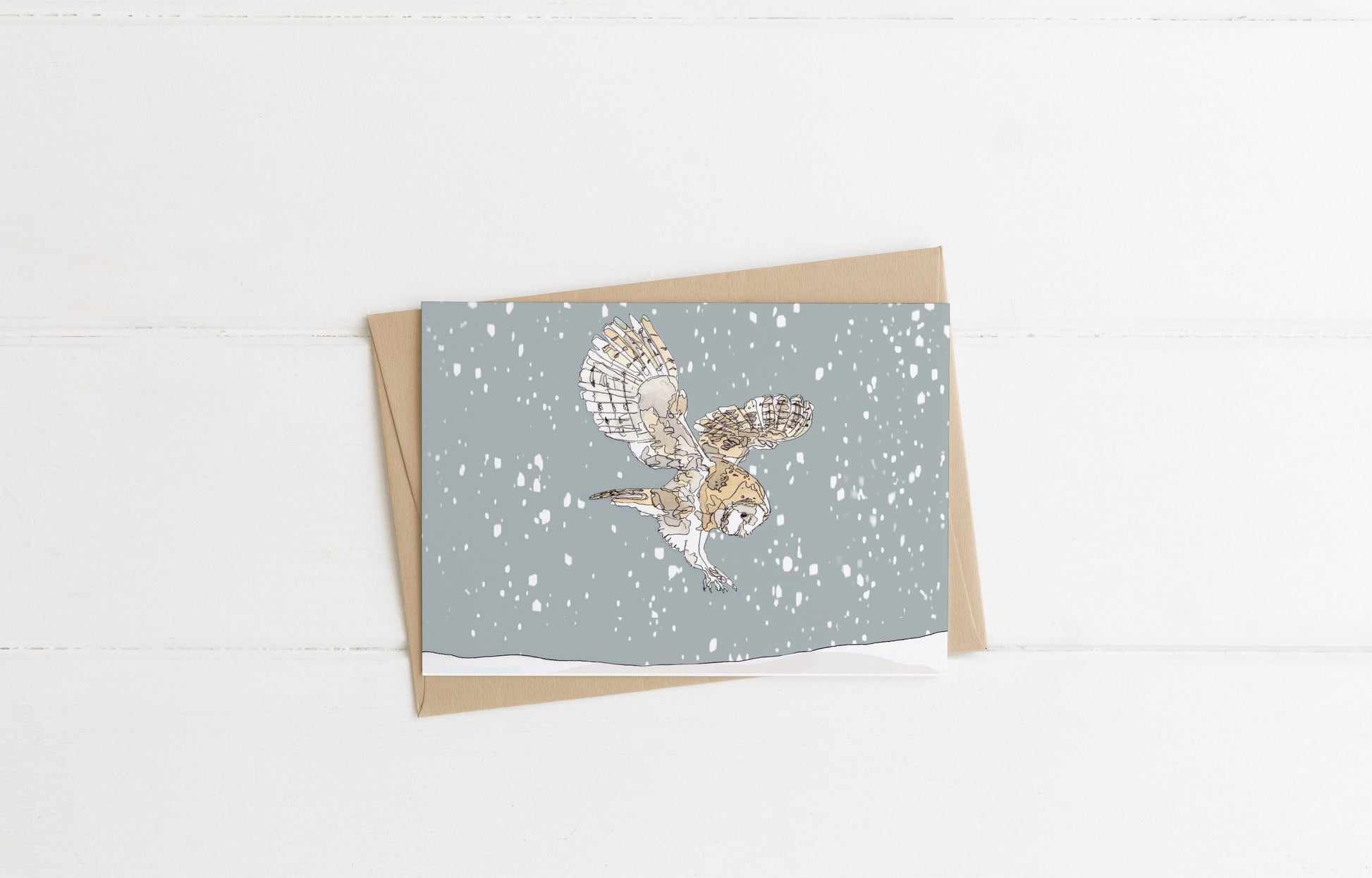 Blank greeting card and envelope  hunting barn owl in the snow christmas card festive winter contemporary illustration animal artist ann pease card art 